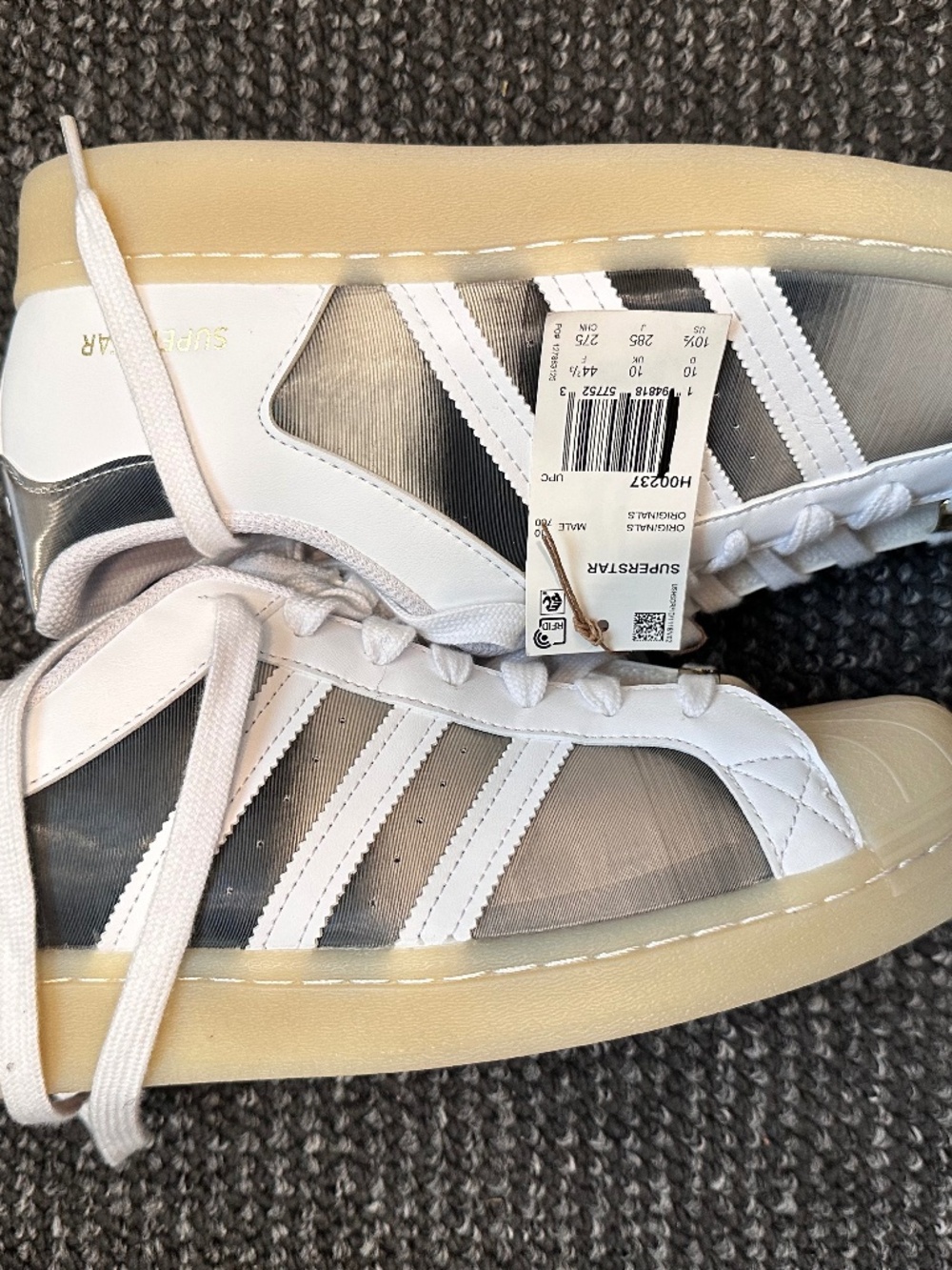Adidas Superstar Futureshell shoes in white with a translucent sole.